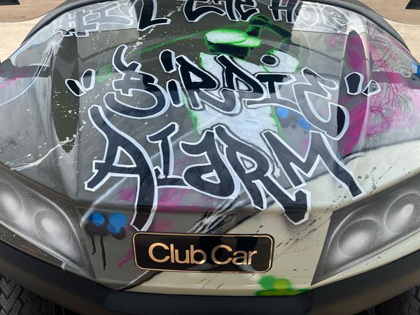 Golfcart mit Graffiti Golfcart mit Graffit für den Golfnachwuchs.